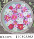 Pink and white flower float 140398862