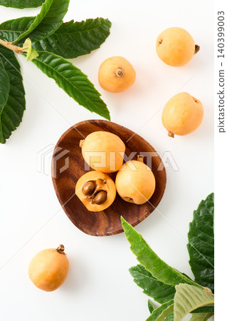 Loquats arranged on a plate Loquats arranged on a plate 140399003