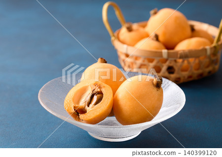 Loquats arranged on a plate Loquats arranged on a plate 140399120