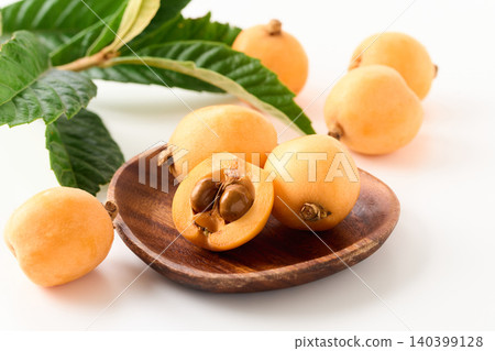 Loquats arranged on a plate Loquats arranged on a plate 140399128