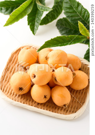 Loquats served in a basket Loquats served in a basket 140399259