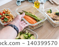 Healthy Meal Prep Containers with Salmon, Chicken and Fresh Vegetables 140399570