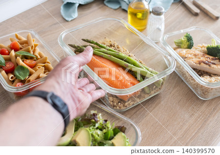 Healthy Meal Prep Containers with Salmon, Chicken and Fresh Vegetables 140399570