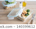 Healthy meal prep containers with salmon, chicken, pasta and fresh vegetables 140399612