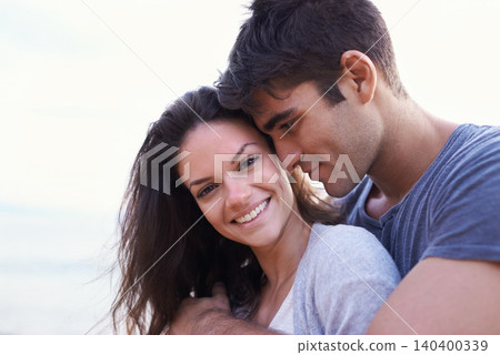 Couple, hug and outdoor with love on holiday or travel together on vacation in summer. Romantic, date and man with gratitude for woman and smile with kindness, care and support for partner in embrace Couple, hug and outdoor with love on holiday or travel together on vacation in summer. Romantic, date and man with gratitude for woman and smile with kindness, care and support for partner in embrace 140400339