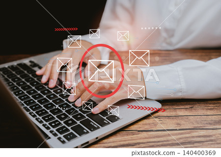 Email concept. Hands Typing on Laptop with Floating Email Icons and Notifications in a Modern Workspace Email concept. Hands Typing on Laptop with Floating Email Icons and Notifications in a Modern Workspace 140400369
