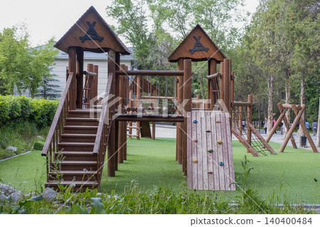 Outdoor kids playground made of natural logs with stairs and bridges. Kyrgyzstan Issyk-Ata June 10, 2026 Outdoor kids playground made of natural logs with stairs and bridges. Kyrgyzstan Issyk-Ata June 10, 2026 140400484