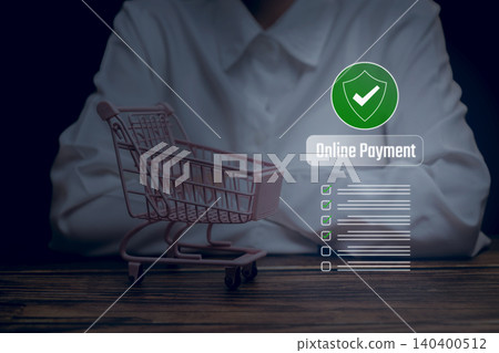 Online payment, shopping cart with secure checkout checklist and shield icon, ecommerce transaction safety and digital purchasing trust Online payment, shopping cart with secure checkout checklist and shield icon, ecommerce transaction safety and digital purchasing trust 140400512