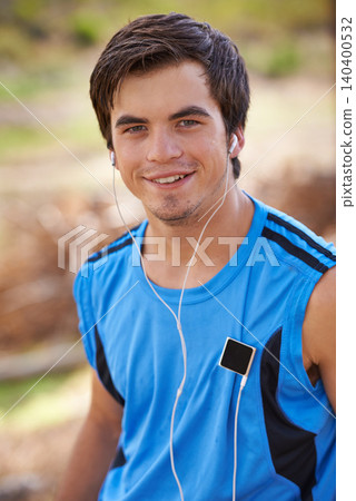 Music player, portrait or or runner with earphones for running, outdoor exercise or fitness workout. Radio, streaming song or man listening to podcast for performance, podcast and sports training Music player, portrait or or runner with earphones for running, outdoor exercise or fitness workout. Radio, streaming song or man listening to podcast for performance, podcast and sports training 140400532