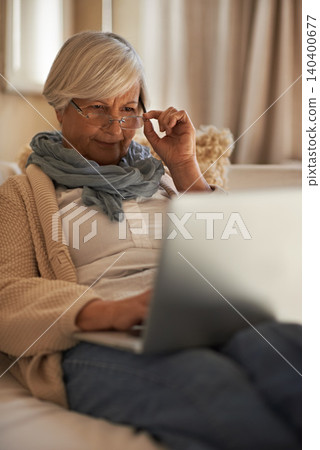 Senior woman, laptop and internet for website in home, retirement planning and glasses for reading. Elderly female person, online and networking or browse on blog, relax and pension for investment Senior woman, laptop and internet for website in home, retirement planning and glasses for reading. Elderly female person, online and networking or browse on blog, relax and pension for investment 140400677
