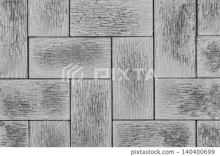 Grey concrete paving slabs background with textured grooved surface Grey concrete paving slabs background with textured grooved surface 140400699
