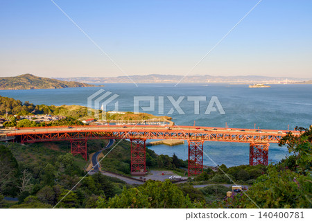 Golden Gate Bridge hillside path with San Francisco skyline across bay Golden Gate Bridge hillside path with San Francisco skyline across bay 140400781
