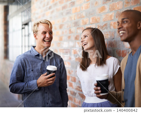Friends, university and group in a hallway, conversation and funny with humor and lunch break. Students, college and men with woman in a lobby or education with laughing or joke with knowledge or joy Friends, university and group in a hallway, conversation and funny with humor and lunch break. Students, college and men with woman in a lobby or education with laughing or joke with knowledge or joy 140400842