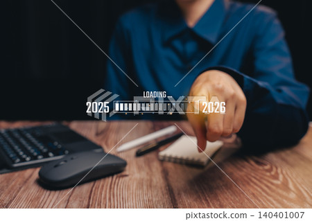 Person Pointing at Notepad While Sitting at Wooden Desk, Business concept Person Pointing at Notepad While Sitting at Wooden Desk, Business concept 140401007