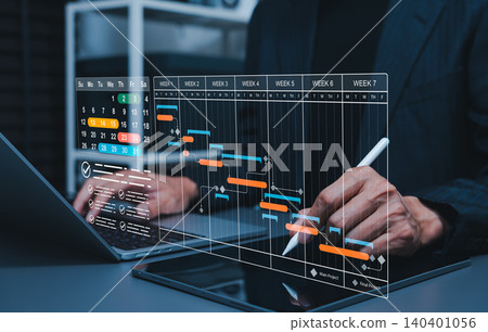 Project schedule planning and Gantt chart management concept. Businessman using tablet, calendar timeline, task checklist, weekly milestones, workflow tracking, deadline control, and productivity 140401056