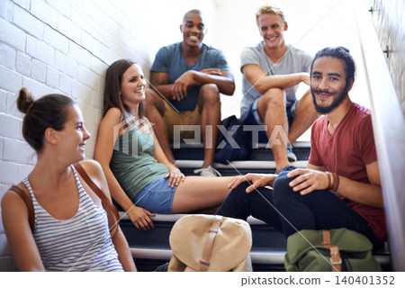 University, steps and students with happiness, friends and smile together, classmates and conversation. Campus, women and men in course for education with scholarship, relax and people on stairs 140401352