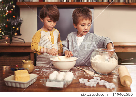 Kids, baking and playing in kitchen with flour, home and bonding with ingredients for dessert cake. Children, mixing and bowl for cookies on counter, eggs and boys learning of pastry recipe by butter Kids, baking and playing in kitchen with flour, home and bonding with ingredients for dessert cake. Children, mixing and bowl for cookies on counter, eggs and boys learning of pastry recipe by butter 140401590