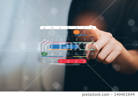 Digital Calendar Interface Being Touched by a Person in a Modern Setting with Abstract Background 140401644