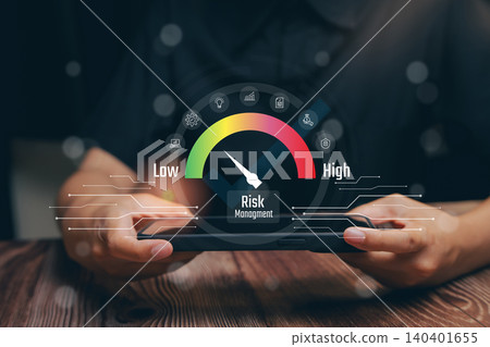 Risk Management Meter on Smartphone Screen Showing Low to High Levels of Risk in Business Context Risk Management Meter on Smartphone Screen Showing Low to High Levels of Risk in Business Context 140401655
