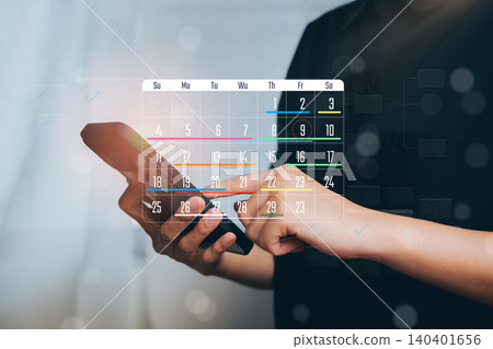 Person Using Mobile Device to Manage Calendar with Digital Interface and Data Visualization Person Using Mobile Device to Manage Calendar with Digital Interface and Data Visualization 140401656
