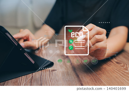 Eco concept. Person Using Tablet to Review Eco-Friendly Document with Green Checkmarks and Digital Elements in Modern Workspace Eco concept. Person Using Tablet to Review Eco-Friendly Document with Green Checkmarks and Digital Elements in Modern Workspace 140401699
