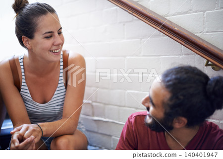 Campus, woman and man together on stairs with smile, backpack and classmates as friends. University, school and people in course for education with scholarship, laughing and conversation to relax Campus, woman and man together on stairs with smile, backpack and classmates as friends. University, school and people in course for education with scholarship, laughing and conversation to relax 140401947