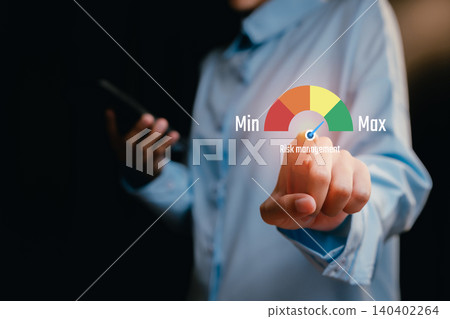 Finger Pointing at Risk Management Gauge in Business Environment, business concept 140402264