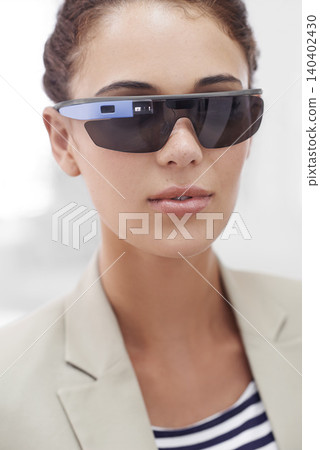 Virtual reality, portrait and woman with smart glasses for technology, internet or protection from sun. Metaverse, bokeh and face of female person for sunglasses, innovation and user experience. Virtual reality, portrait and woman with smart glasses for technology, internet or protection from sun. Metaverse, bokeh and face of female person for sunglasses, innovation and user experience. 140402430