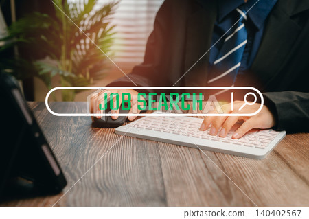 Job Search concept. Professional Job Search Process with Hands Typing on Keyboard and Job Search Graphic Overlay Job Search concept. Professional Job Search Process with Hands Typing on Keyboard and Job Search Graphic Overlay 140402567