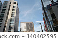 The sky seen from the valley of the buildings 140402595