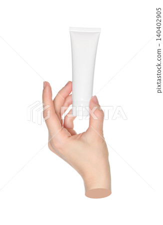 Woman hand holds a white cosmetic cream tube, on transparent background close-up, template for cosmetics ads. Contemporary art 140402905