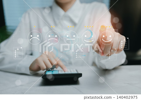 Evaluating Customer Feedback Using Calculator and Emotion Icons, business concept 140402975