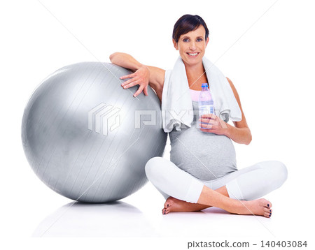 Pregnant female person, portrait and studio for final trimester, wellness and exercise for motherhood. Maternal woman, workout and white background for health, fitness and ball for towel and water Pregnant female person, portrait and studio for final trimester, wellness and exercise for motherhood. Maternal woman, workout and white background for health, fitness and ball for towel and water 140403084