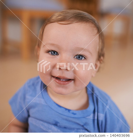 Toddler, smile and portrait of baby in home for fun playing, happiness or learning in living room. Relax, healthy boy or face of a male kid on floor for child development or growth in a house alone 140403696