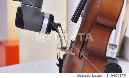 Robotic arm performing music on a cello, blending artificial intelligence and art 140404155