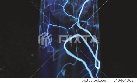 Blue electric plasma discharge creating light patterns in a science demonstration Blue electric plasma discharge creating light patterns in a science demonstration 140404302