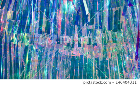 Iridescent tinsel streamers creating a sparkling holographic rainbow background texture Iridescent tinsel streamers creating a sparkling holographic rainbow background texture 140404311
