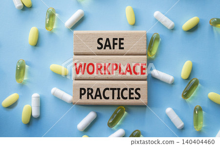 Safe Workplace Practices symbol. Concept words Safe Workplace Practices on wooden blocks. Beautiful blue background with pills. Healthcare and Safe Workplace Practices concept. Copy space. Safe Workplace Practices symbol. Concept words Safe Workplace Practices on wooden blocks. Beautiful blue background with pills. Healthcare and Safe Workplace Practices concept. Copy space. 140404460