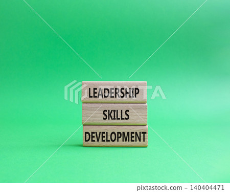 Leadership skills development symbol. Concept word Leadership skills development on wooden blocks. Beautiful green background. Business and Leadership skills development. Copy space Leadership skills development symbol. Concept word Leadership skills development on wooden blocks. Beautiful green background. Business and Leadership skills development. Copy space 140404471