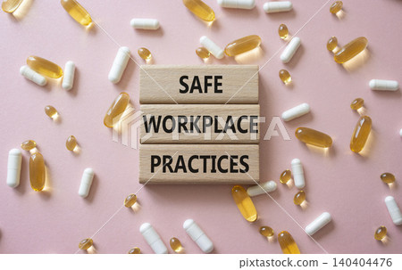 Safe Workplace Practices symbol. Concept words Safe Workplace Practices on wooden blocks. Beautiful pink background with pills. Healthcare and Safe Workplace Practices concept. Copy space. Safe Workplace Practices symbol. Concept words Safe Workplace Practices on wooden blocks. Beautiful pink background with pills. Healthcare and Safe Workplace Practices concept. Copy space. 140404476
