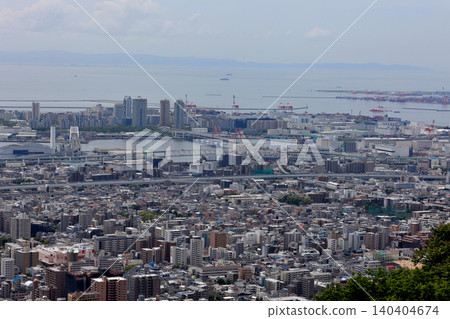 View of Rokko Island from the rest area between Hokura Shrine and Kinchozan Mountain. View of Rokko Island from the rest area between Hokura Shrine and Kinchozan Mountain. 140404674