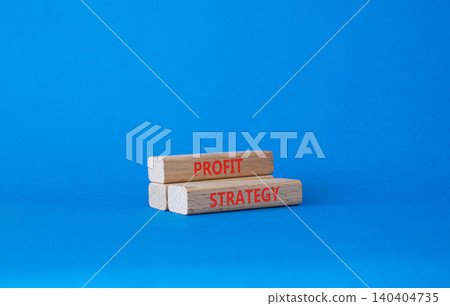Profit strategy symbol. Concept word Profit strategy on wooden blocks. Beautiful blue background. Business and Profit strategy concept. Copy space Profit strategy symbol. Concept word Profit strategy on wooden blocks. Beautiful blue background. Business and Profit strategy concept. Copy space 140404735