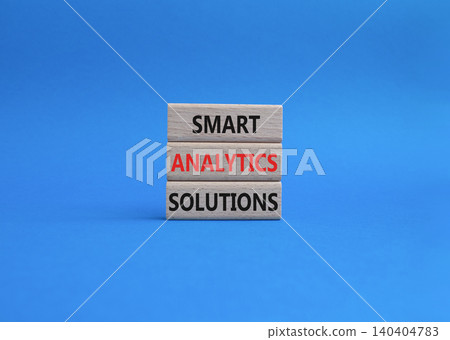 Smart Analytics Solutions symbol. Concept word Smart Analytics Solutions on wooden blocks. Beautiful blue background. Business and Smart Analytics Solutions. Copy space 140404783