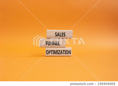 Sales Funnel Optimization symbol. Concept word Sales Funnel Optimization on wooden blocks. Businessman hand. Beautiful grey background. Business and Sales Funnel Optimization. Copy space Sales Funnel Optimization symbol. Concept word Sales Funnel Optimization on wooden blocks. Businessman hand. Beautiful grey background. Business and Sales Funnel Optimization. Copy space 140404809