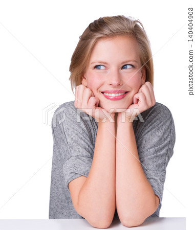 Woman, smile and studio with hands, planning or daydreaming or thinking. Model, nostalgia or ideas with contemplating, wondering or playful or thoughtful and sitting isolated on white background 140404908