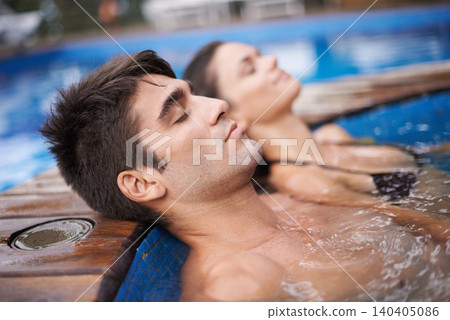 Couple, swimming pool and holiday rest at resort for honeymoon vacation for summer, stress relief or weekend. Man, woman and eyes closed for travel jacuzzi or peaceful trip in Hawaii, calm or outdoor 140405086