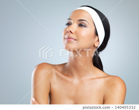 Latina woman, face and skin for beauty, skincare and cosmetics on gray background with glamour, elegance and natural glow. Mexican female person, model and radiance for cleansing, dermatology or care Latina woman, face and skin for beauty, skincare and cosmetics on gray background with glamour, elegance and natural glow. Mexican female person, model and radiance for cleansing, dermatology or care 140405332