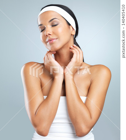 Young woman, beauty and skincare in studio background smile, happy and proud with headband. Female model, makeup and cosmetics for work with confidence, satisfaction and pride with eyes closed Young woman, beauty and skincare in studio background smile, happy and proud with headband. Female model, makeup and cosmetics for work with confidence, satisfaction and pride with eyes closed 140405410