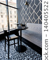 Modern cafe interior with large window and city view. 140405522