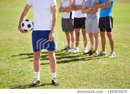 Person, team and hand holding soccer ball for game, training and competition with fitness. People, group and football player with coach, captain or leader for sports, exercise or workout for contest Person, team and hand holding soccer ball for game, training and competition with fitness. People, group and football player with coach, captain or leader for sports, exercise or workout for contest 140405674